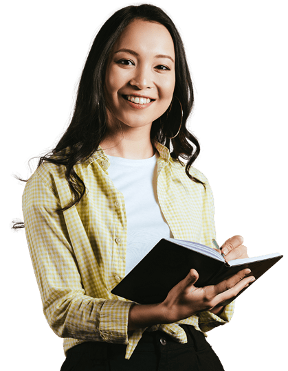 Confident student holding books and smiling